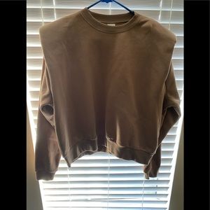 Brown sweatshirt with shoulder pads